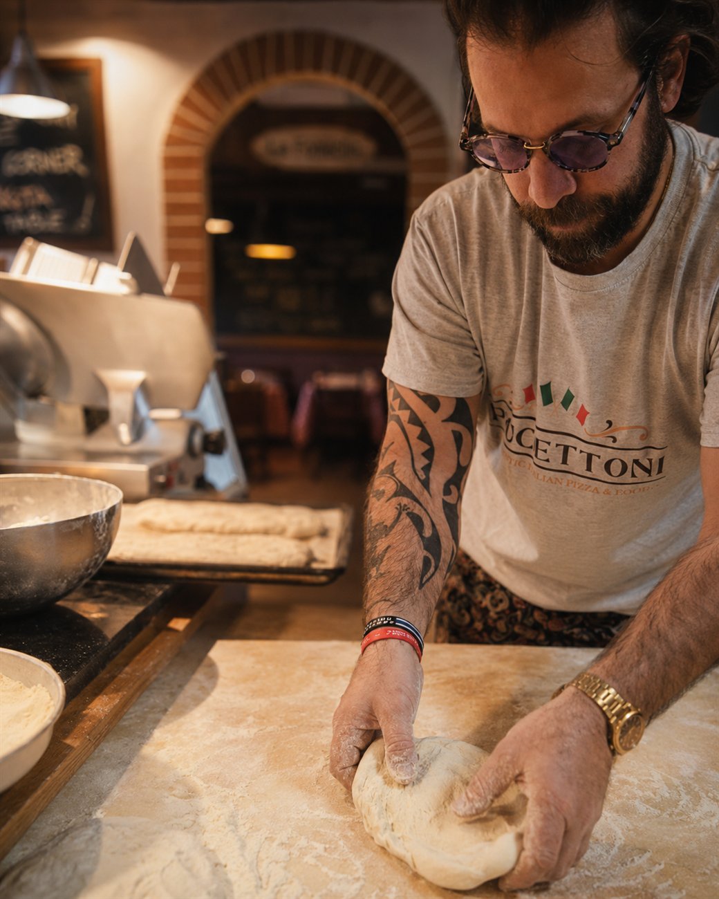 Chef Marco hand-working fresh dough at Puccettoni